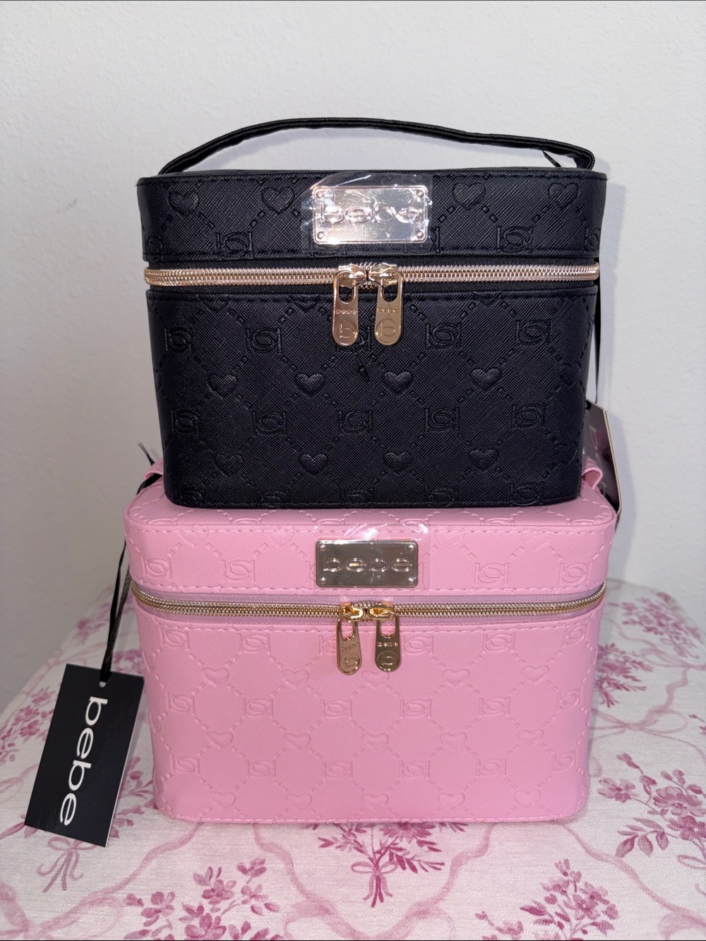 bebe Pink and Black Embossed Cosmetic Train Case Set with Gold Hardware